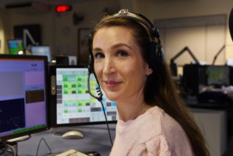 Radio officer monitoring communications
